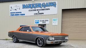 1968 Chevrolet Chevelle Malibu in front of shop