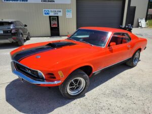 1969 Red Ford Mustang Mach 1 front-end driver side