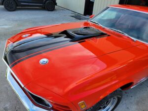 1969 Red Ford Mustang Mach 1 driver side hood