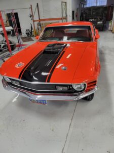 1969 Red Ford Mustang Mach 1 in shop