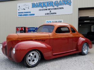 Classic car with custom orange and red paint