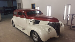 Classic car with custom red and white paint